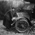 Driver Of The First Aid Nursing Yeomanry Cranking Up An Ambulance 590x456 150x150